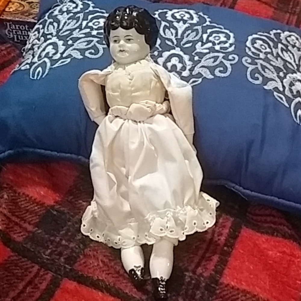 Turn of the century German porceline head doll.